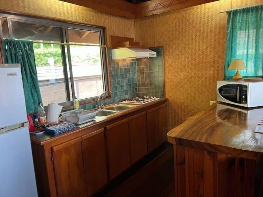Tehuarupe Surf Studios Haapiti Luaran gambar